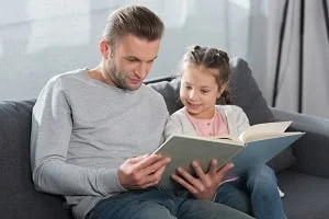 father and daughter reading resized