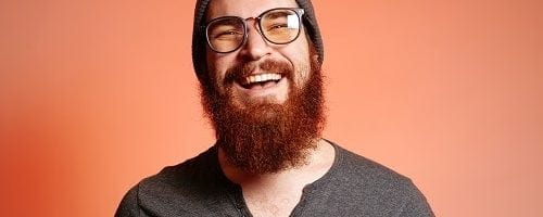 brochure 8 man with red beard and glasses resized