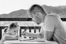 Father and daughter working together