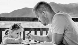 Father and daughter working together