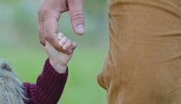 father daughter walk hand in hand