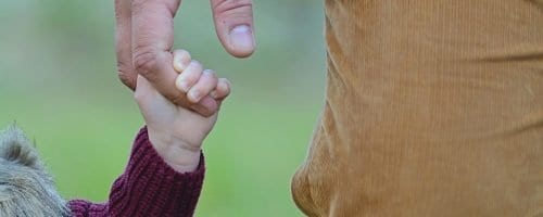 father daughter walk hand in hand