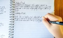 A young boy writes a diary of events during coronavirus lockdown as handwriting practice and to remember current events in the future. It is also a good home schooling activity.