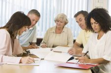 Adult students studying together