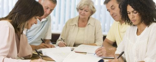 Adult students studying together